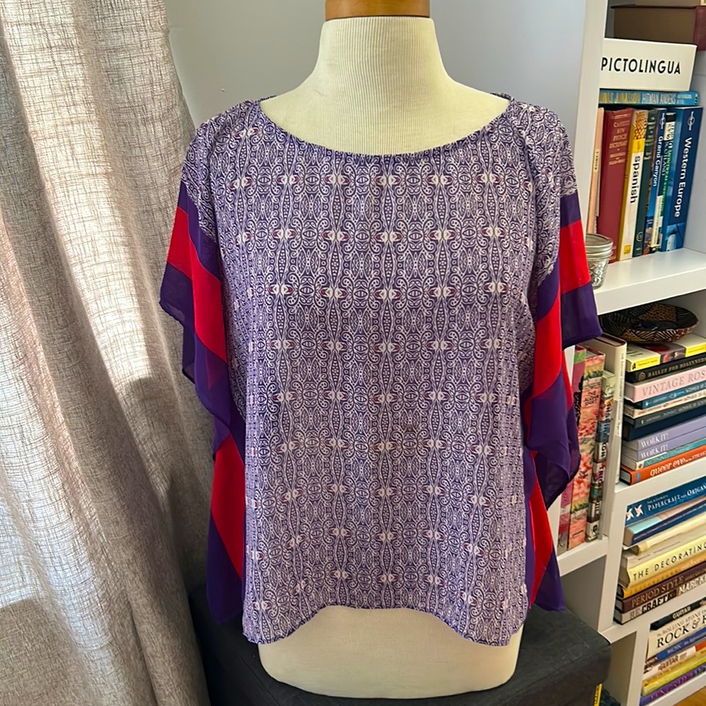 Unique purple and red tunic with bold stripes